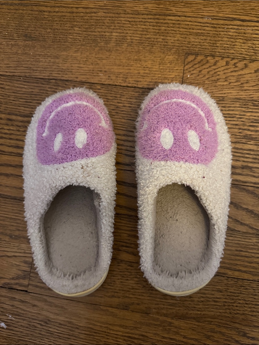 Amazon Cream and Pink Plush Kids Footie Slippers with Smiley